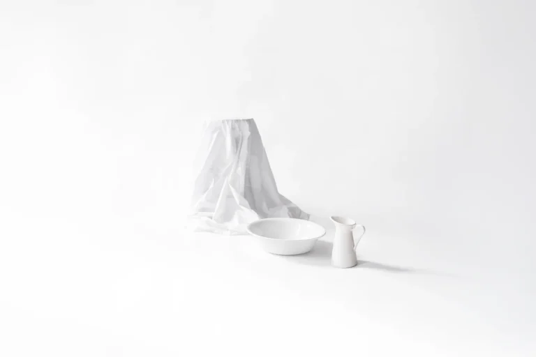 White chair, white carraffe and white tub